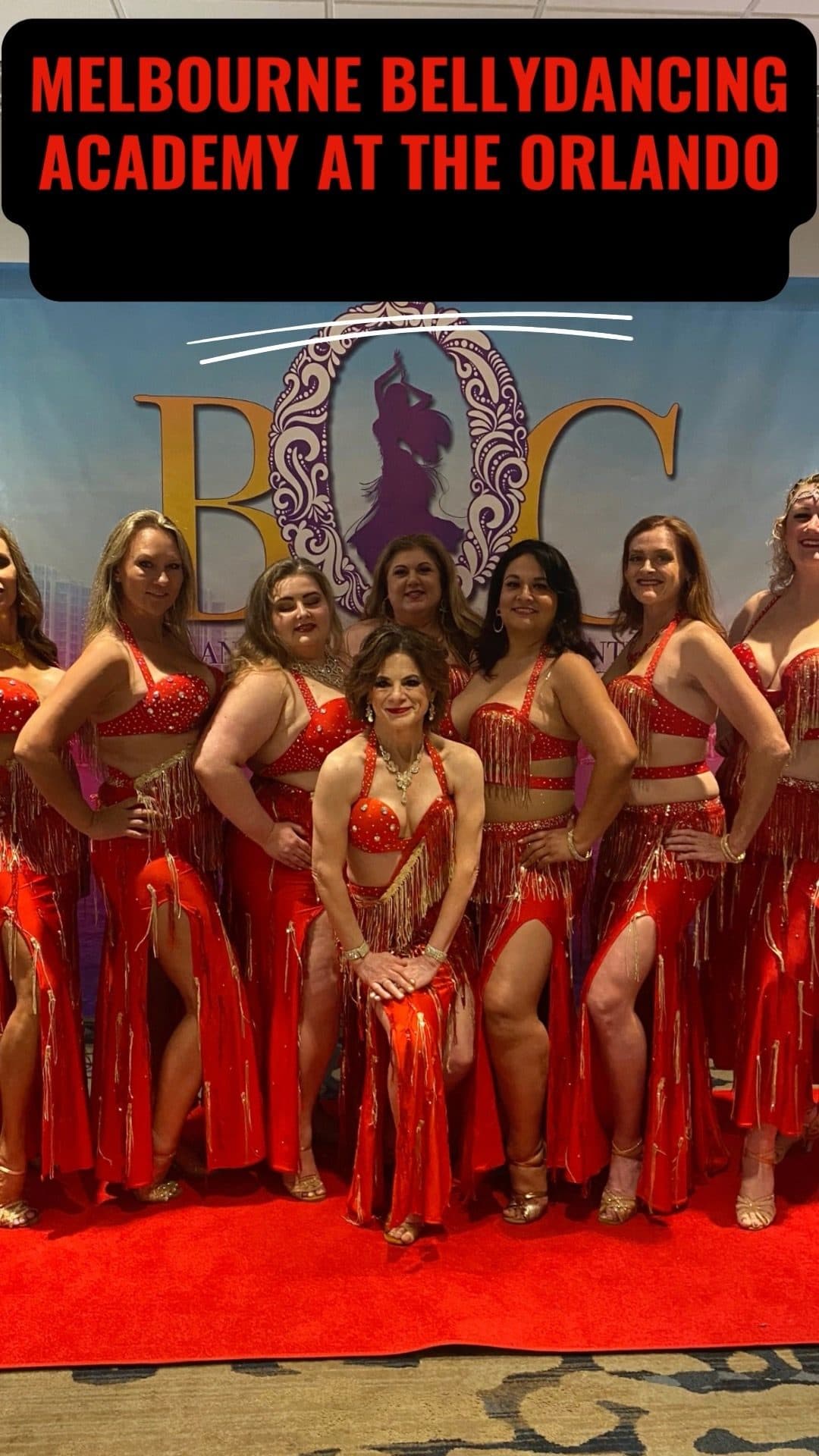 The Melbourne Belly Dancing troupe in red costumes at the Orlando Belly Dance Convention