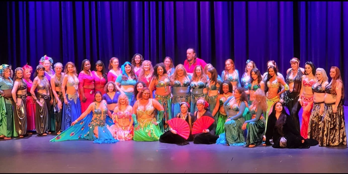 A full stage of Melbourne Belly Dancing students at a showcase